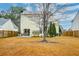Backyard view of house with tree and patio at 3312 Middlesboro Ave, Summerville, SC 29485
