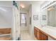 Bathroom with walk-in shower, built-in seat, and wood vanity at 3312 Middlesboro Ave, Summerville, SC 29485