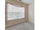 Bright bedroom with large window, carpet, and floral curtains at 3312 Middlesboro Ave, Summerville, SC 29485