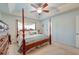 Spacious bedroom with a post bed, dresser, and carpet flooring at 3312 Middlesboro Ave, Summerville, SC 29485