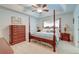 Spacious bedroom with a post bed, dresser, and carpet flooring at 3312 Middlesboro Ave, Summerville, SC 29485