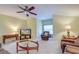 Spacious bonus room with TV, seating, and ceiling fan at 3312 Middlesboro Ave, Summerville, SC 29485