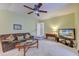 Bonus room with sofa, coffee table, and flat-screen TV at 3312 Middlesboro Ave, Summerville, SC 29485