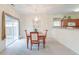 Bright dining area with sliding glass doors leading to backyard at 3312 Middlesboro Ave, Summerville, SC 29485