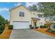 Beautiful two-story house with a large driveway and well-maintained landscaping at 3312 Middlesboro Ave, Summerville, SC 29485
