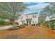 House front yard with tree, landscaping, and driveway at 3312 Middlesboro Ave, Summerville, SC 29485