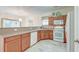Well-equipped kitchen with wood cabinets and tile flooring at 3312 Middlesboro Ave, Summerville, SC 29485