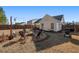 Large backyard with fire pit and string lights at 344 Slow Mill Dr, Goose Creek, SC 29445