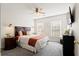 Cozy bedroom with a queen-size bed and neutral color palette at 344 Slow Mill Dr, Goose Creek, SC 29445