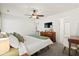 Bright bedroom with a king-size bed and ensuite bathroom access at 344 Slow Mill Dr, Goose Creek, SC 29445