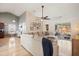 Spacious living room featuring a large sectional sofa and access to backyard at 344 Slow Mill Dr, Goose Creek, SC 29445