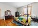 Elegant main bedroom with a four-poster bed and ample natural light at 3687 Hilton Dr, Johns Island, SC 29455