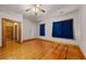 Large bedroom with hardwood floors and two windows at 3687 Hilton Dr, Johns Island, SC 29455