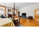 Spacious bedroom with a four-poster bed and access to another room at 3687 Hilton Dr, Johns Island, SC 29455