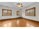 Bright bedroom with hardwood floors and multiple windows at 3687 Hilton Dr, Johns Island, SC 29455