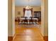 Formal dining room with a large table, chandelier, and hardwood floors at 3687 Hilton Dr, Johns Island, SC 29455