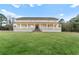 Two-story house with a large front porch and expansive lawn at 3687 Hilton Dr, Johns Island, SC 29455