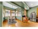 Bright eat-in kitchen with wood flooring and a charming window nook at 3687 Hilton Dr, Johns Island, SC 29455