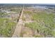 Aerial view of property showing house and surrounding forest at 369 Groomsville Rd, Moncks Corner, SC 29461