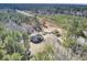 Aerial view of property showing house and surrounding forest at 369 Groomsville Rd, Moncks Corner, SC 29461