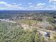 Aerial view of property showing house and surrounding forest at 369 Groomsville Rd, Moncks Corner, SC 29461