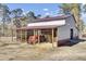 Metal barn with covered area for tractors and hay storage at 369 Groomsville Rd, Moncks Corner, SC 29461