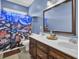 Bathroom with double vanity and ocean-themed shower curtain at 369 Groomsville Rd, Moncks Corner, SC 29461