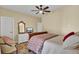 Bedroom with wooden sleigh bed, dresser and ceiling fan at 369 Groomsville Rd, Moncks Corner, SC 29461