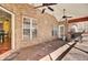 Brick covered patio with ceiling fans, and access to kitchen at 369 Groomsville Rd, Moncks Corner, SC 29461