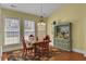 Charming dining area with a unique built-in bar cabinet at 369 Groomsville Rd, Moncks Corner, SC 29461