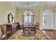 Well-lit dining area with hardwood floors and a lovely rug at 369 Groomsville Rd, Moncks Corner, SC 29461
