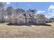 Brick house with dormer windows, and a front porch at 369 Groomsville Rd, Moncks Corner, SC 29461