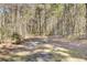 Metal gate entrance to wooded area at 369 Groomsville Rd, Moncks Corner, SC 29461