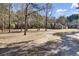 Brick house with large yard and trees at 369 Groomsville Rd, Moncks Corner, SC 29461