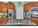 Spacious kitchen featuring stainless steel appliances and ample cabinetry at 369 Groomsville Rd, Moncks Corner, SC 29461
