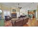 Open living area with hardwood floors, fireplace and kitchen views at 369 Groomsville Rd, Moncks Corner, SC 29461