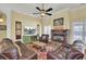 Spacious living room with a fireplace and comfortable seating at 369 Groomsville Rd, Moncks Corner, SC 29461