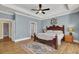 Main bedroom with hardwood floors and ensuite bathroom access at 369 Groomsville Rd, Moncks Corner, SC 29461