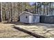 Gray storage shed with wood border at 369 Groomsville Rd, Moncks Corner, SC 29461