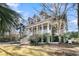 Two-story home with wraparound porch and landscaping at 3715 Channel View Ct, Mount Pleasant, SC 29466