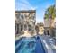 Inviting backyard with a refreshing pool, partially covered in snow at 5099 Ballantine Dr, Summerville, SC 29485