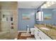 Updated bathroom with a large shower and granite vanity at 5099 Ballantine Dr, Summerville, SC 29485
