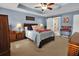 Serene bedroom with ensuite bathroom and barn door at 5099 Ballantine Dr, Summerville, SC 29485
