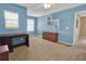 Bedroom with blue walls and wood furniture at 5099 Ballantine Dr, Summerville, SC 29485