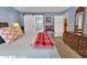 Spacious bedroom with a barn door and a large dresser at 5099 Ballantine Dr, Summerville, SC 29485