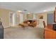 Spacious bonus room with a couch and a table at 5099 Ballantine Dr, Summerville, SC 29485