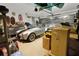 Garage with a classic car and various storage items at 5099 Ballantine Dr, Summerville, SC 29485