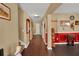 Bright hallway with hardwood floors and access to stairs at 5099 Ballantine Dr, Summerville, SC 29485
