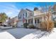 Two-story house with a snow-covered front yard at 5099 Ballantine Dr, Summerville, SC 29485