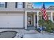 Front entrance with porch and American flag at 5099 Ballantine Dr, Summerville, SC 29485